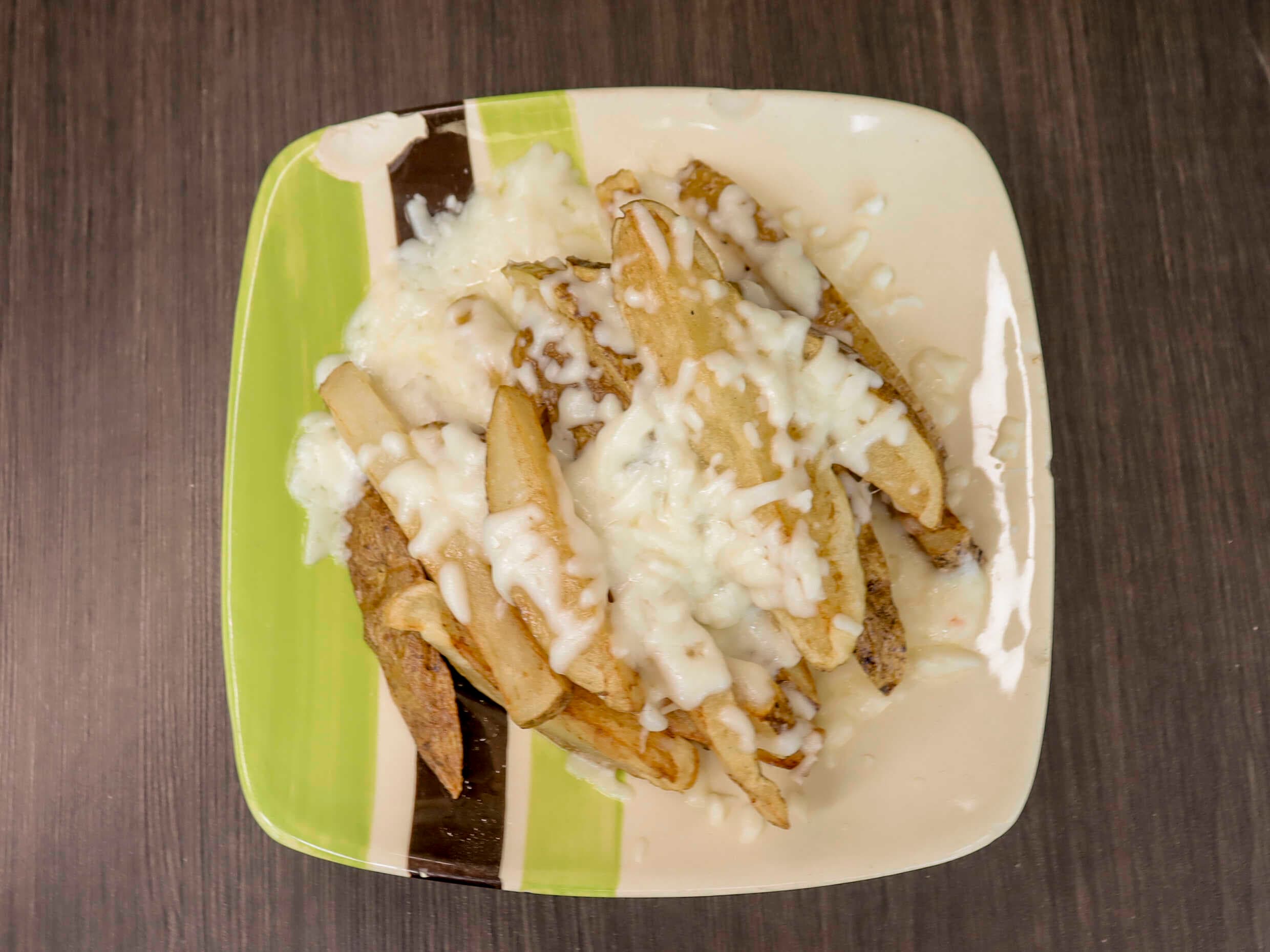 Papas fritas gratinadas