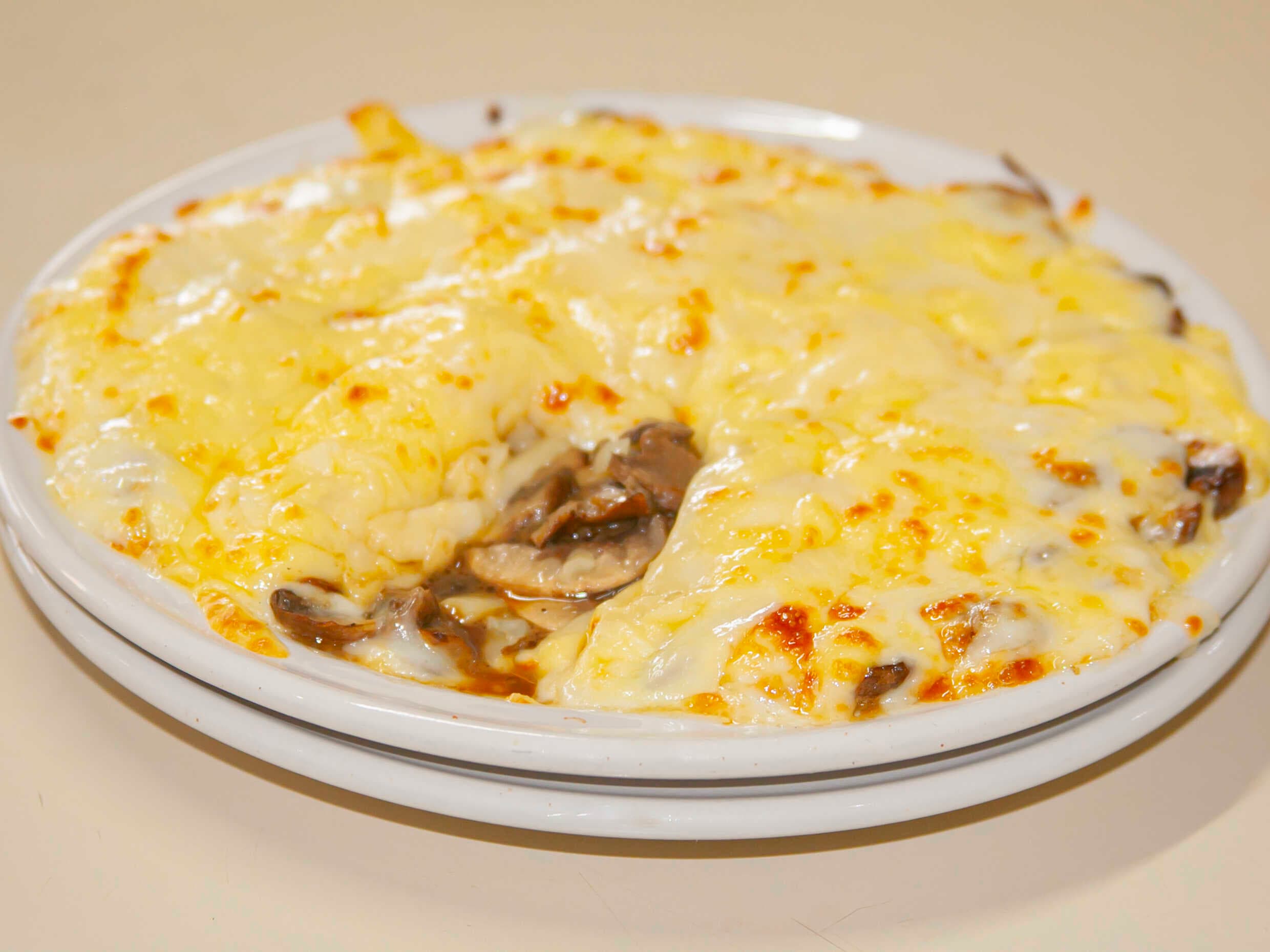 QUESO FUNDIDO CON CHAMPIÑONES