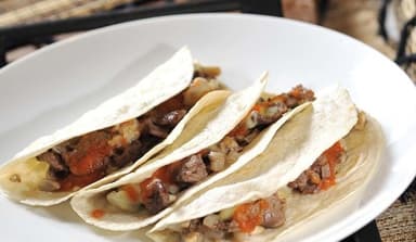 Orden de Bistec con Champiñones