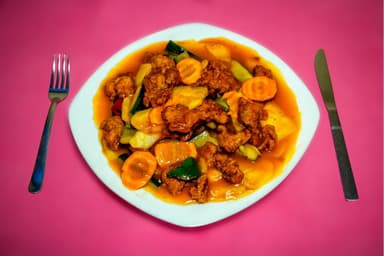 57--Trocitos de Pollo en Salsa ostiones