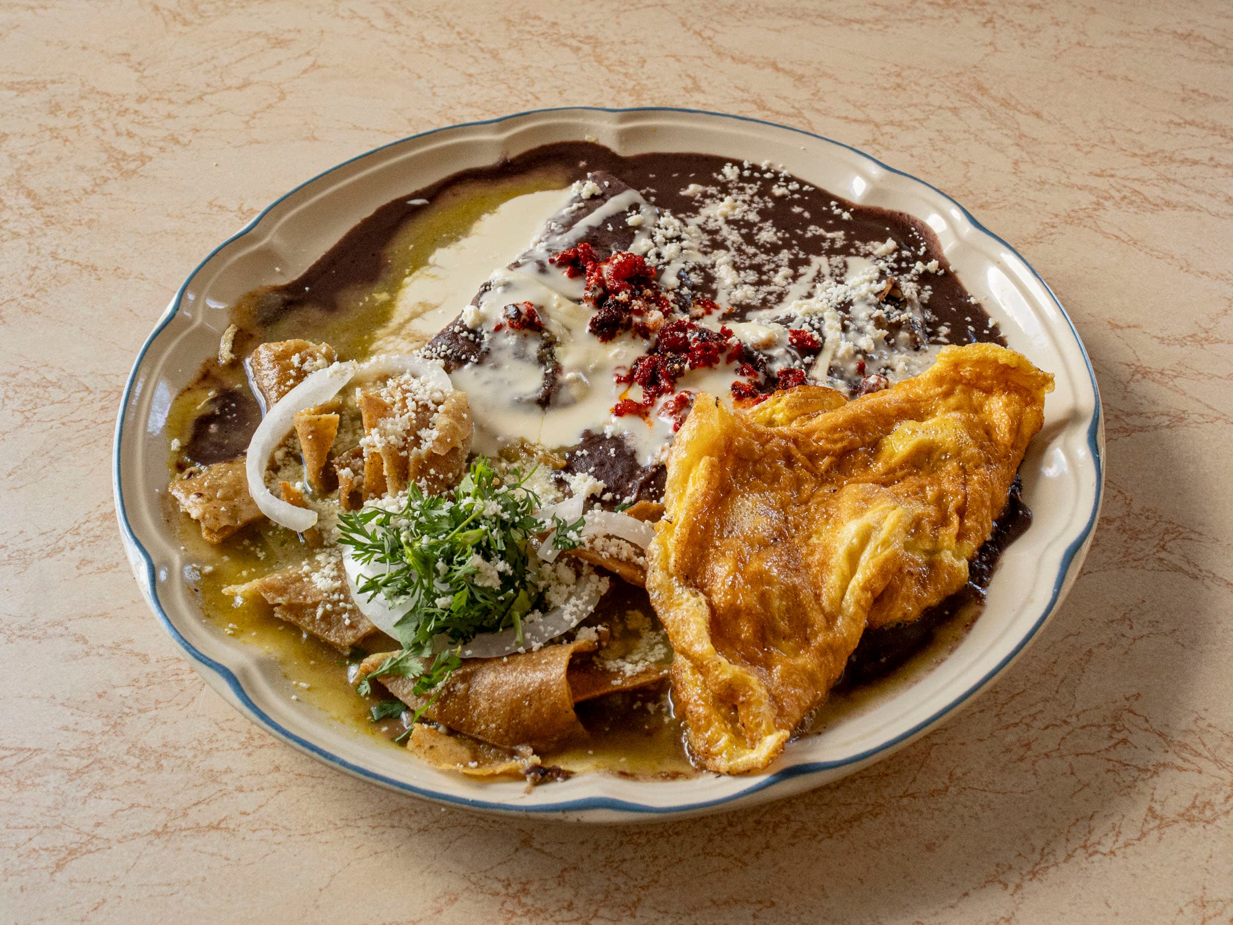 Combo 2 Enchiladas + Frijoles + Huevo +Café