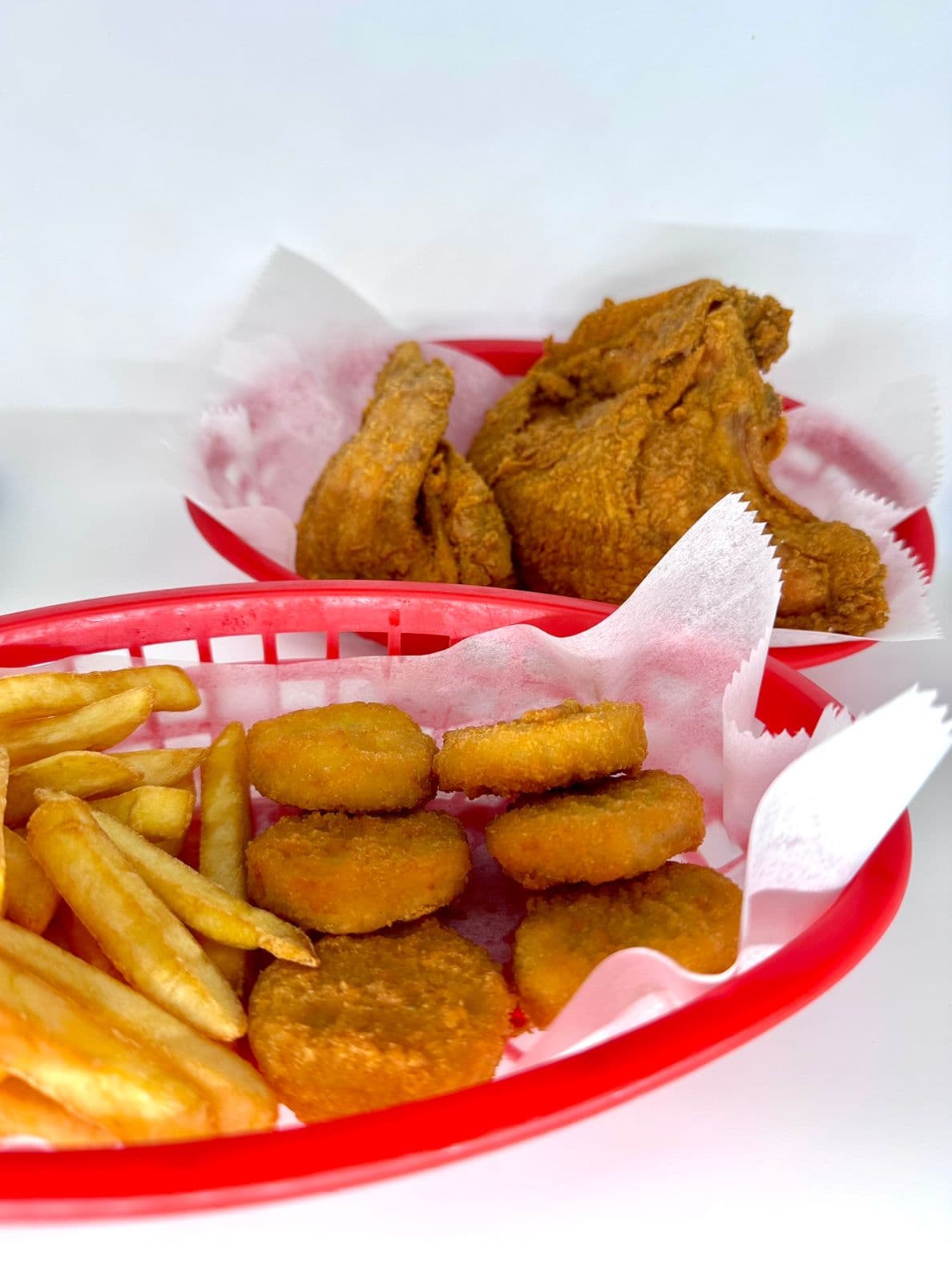 Paquete 2 Piezas + Papas ó Nuggets
