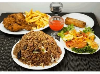 1 Arroz Grande 3 Carnes + 1/2 Pollo Broaster