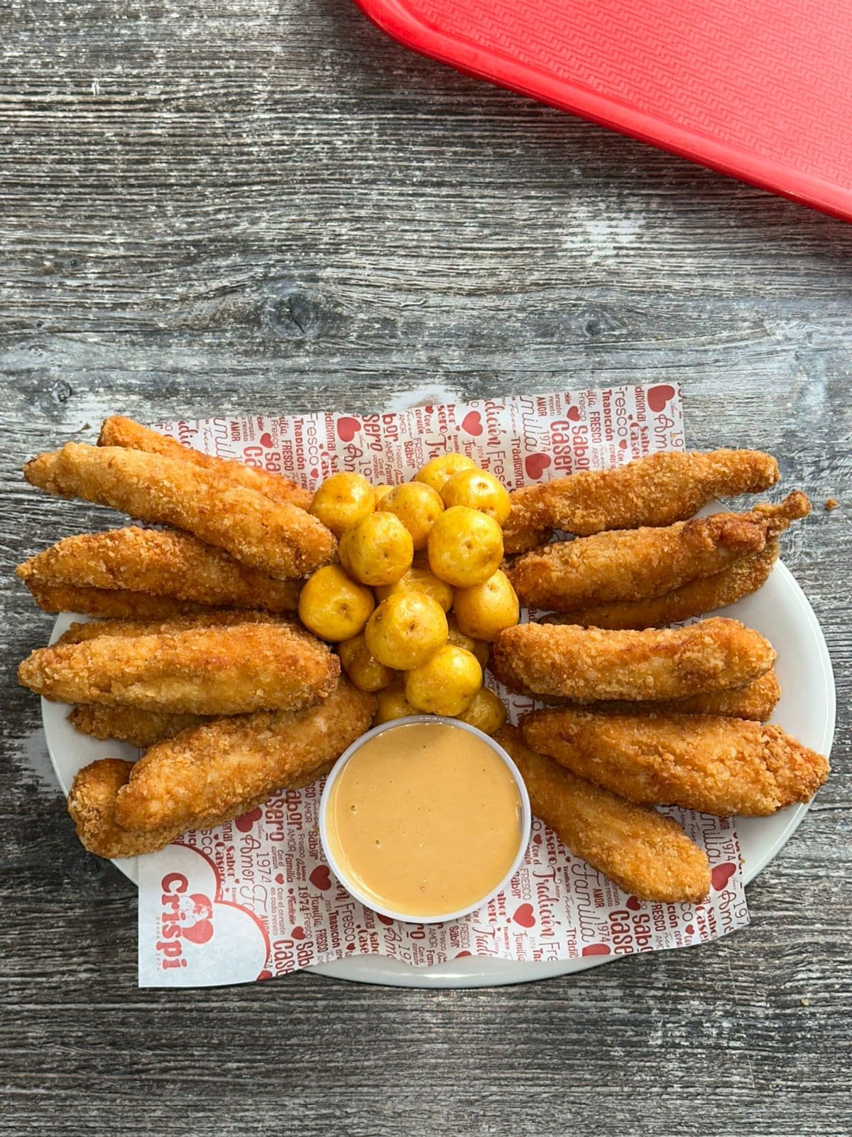 Crispi Tenders x16 + papas + salsa crispi