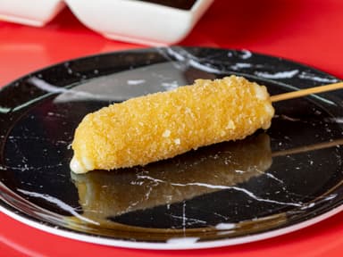 Brocheta Empanizada de Queso Manchego Pieza