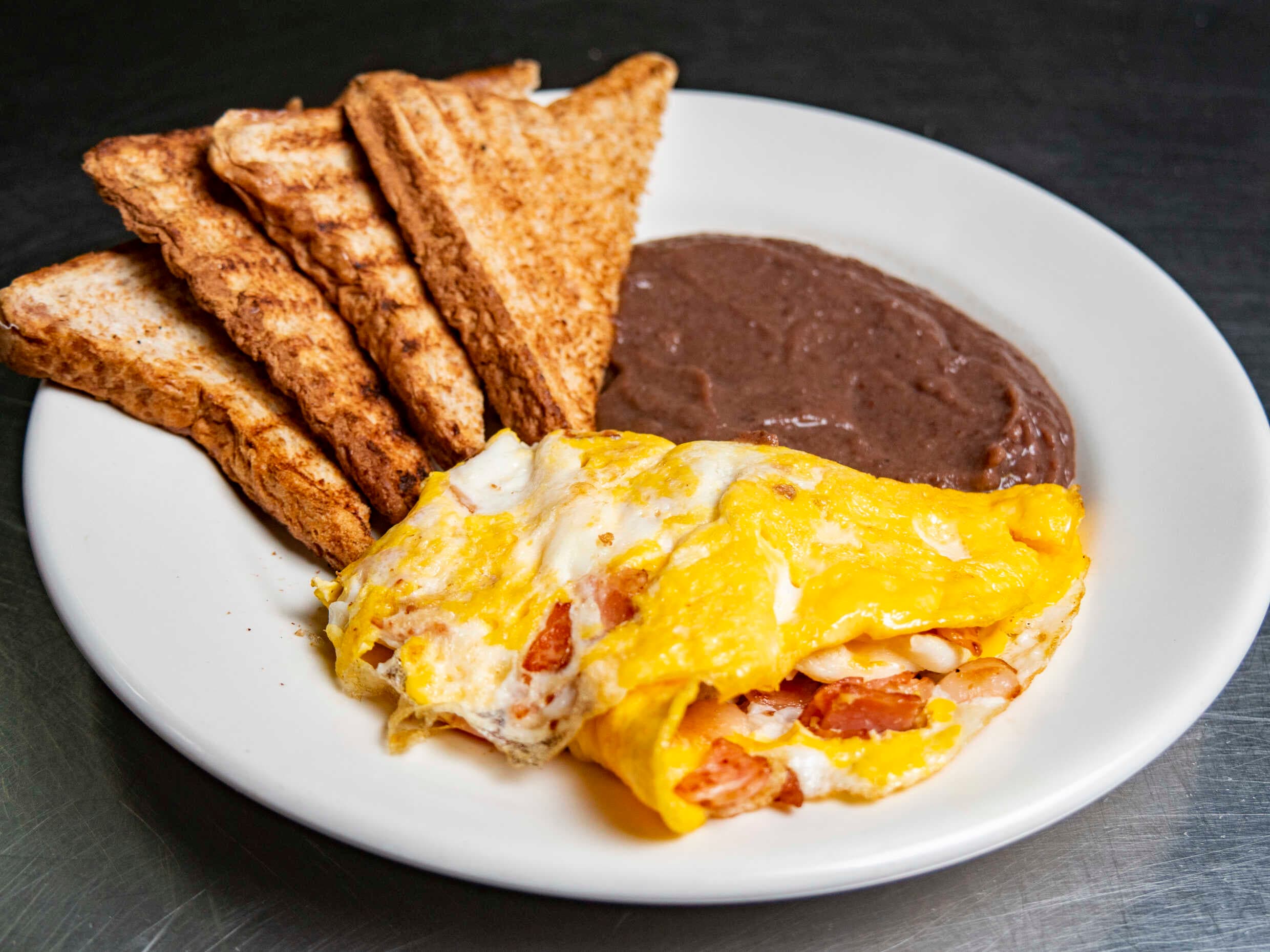 HUEVOS CON TOCINO