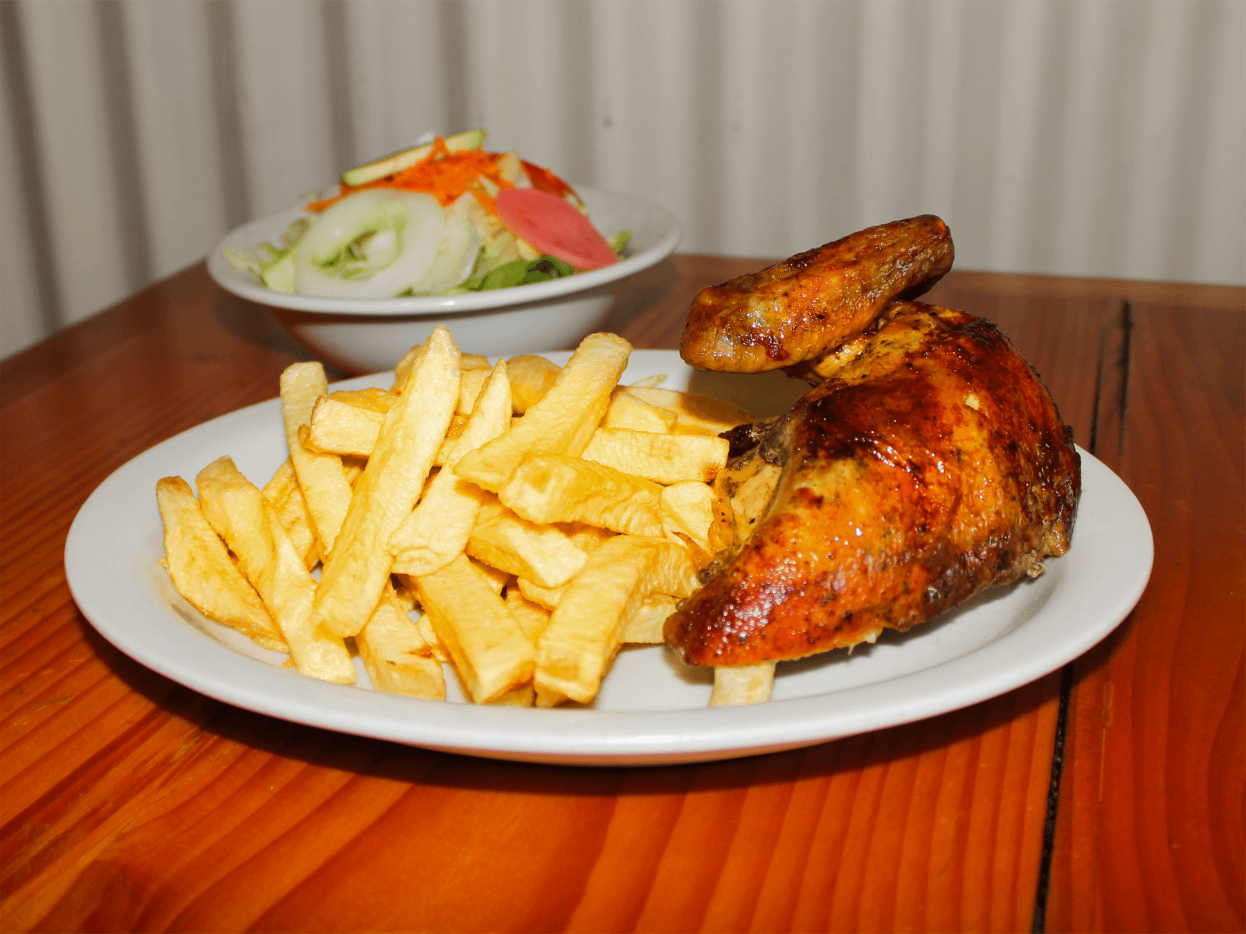 Un Cuarto de Pollo Excelencia