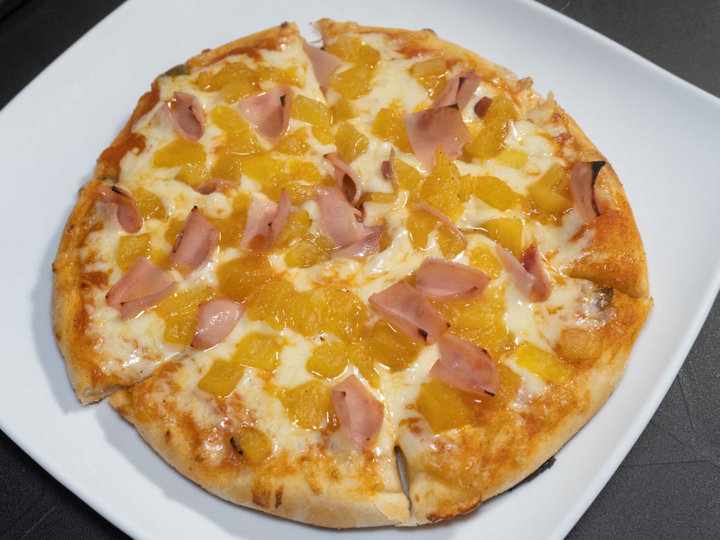 Pizza Clásica Mediana (8 porc) + Econolitro