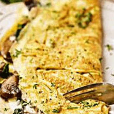 Omelette de champiñones
