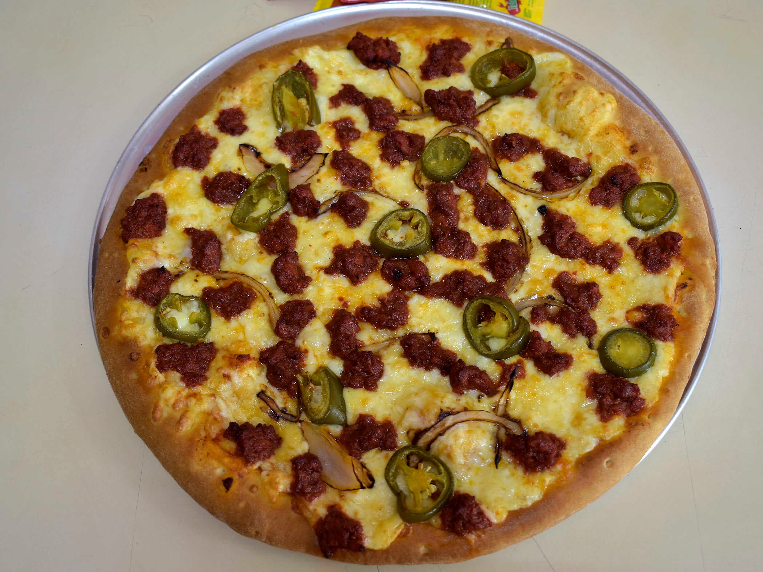 Combo-Dos pizzas medianas + 1 Refresco 2lts