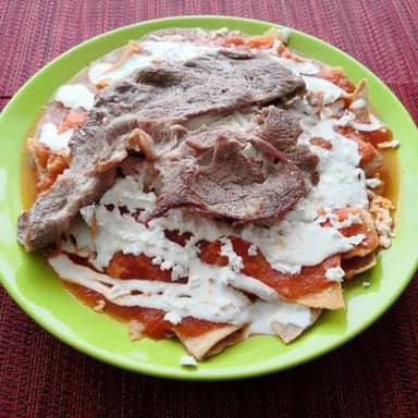 Carne asada con chilaquiles gratinados 9:00am-1:00