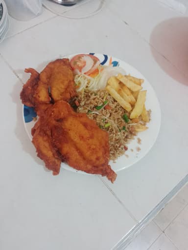 Pollo al carbón entero