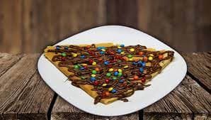 Crepa M&M's con Nutella, Philadelphia y Fresa