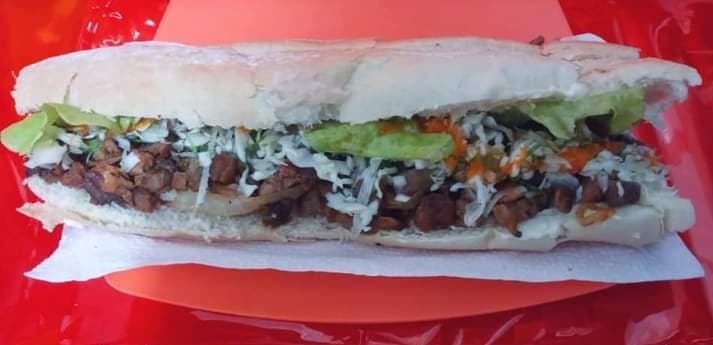 Tranca de Carnitas + Coca Cola