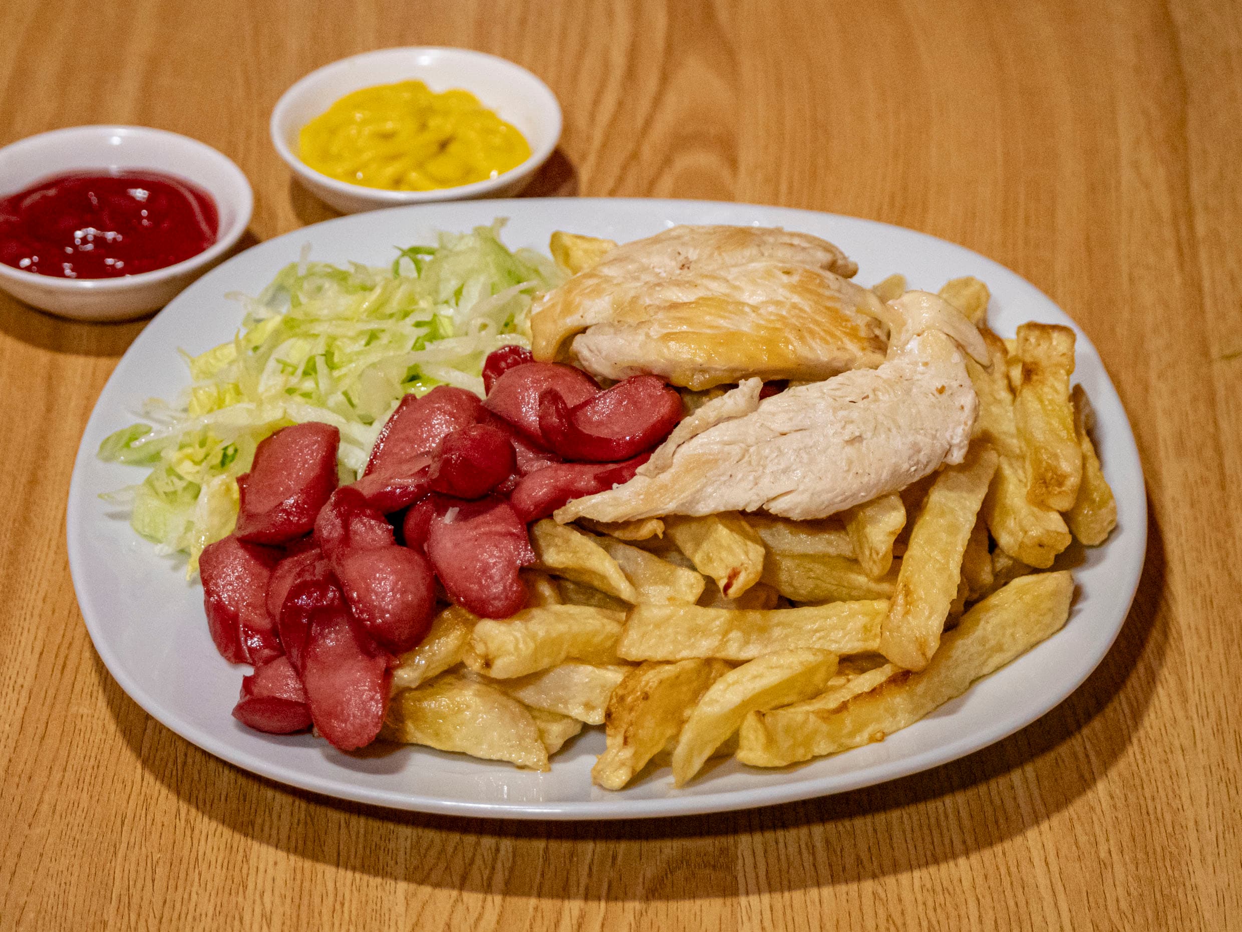 Salchipapa con Filete