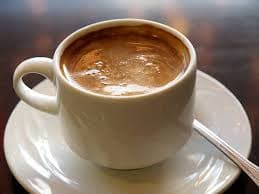 Café con Leche y pan de la casa