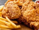 Porción de Pollo a la Broaster