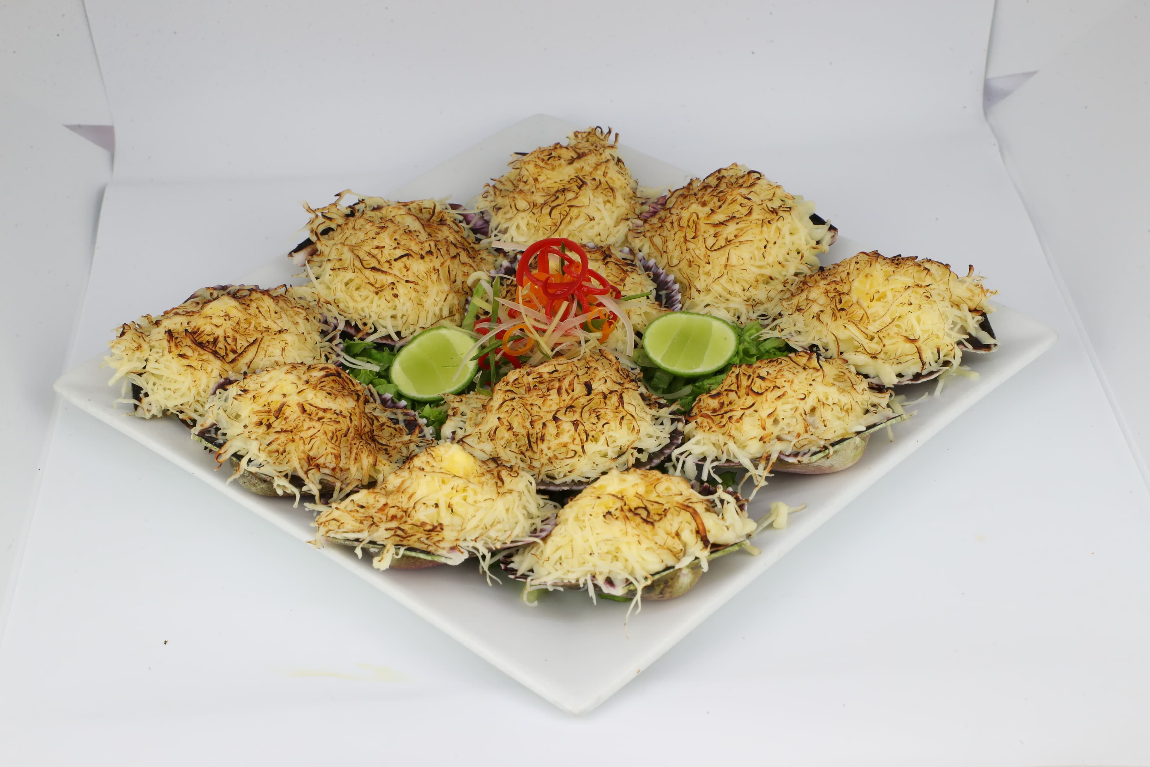 Conchitas a la Parmesana