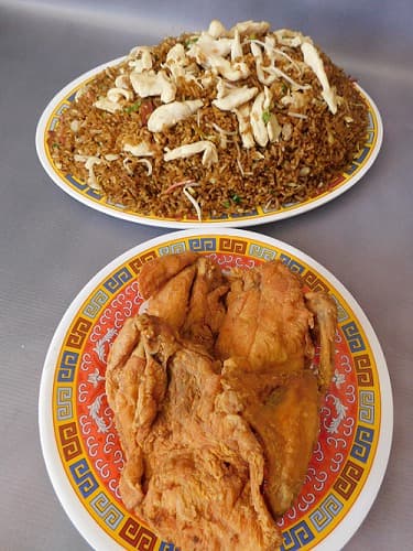 1 Caja Grande de Arroz Chino + 1/2 Pollo Apanado.