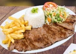 Chuleta de Cerdo a la Plancha + Gaseosa 250 ml