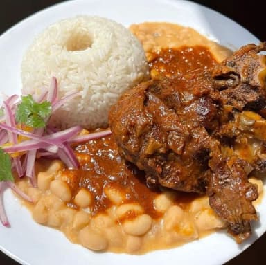 Seco de Cabrito con Frejoles