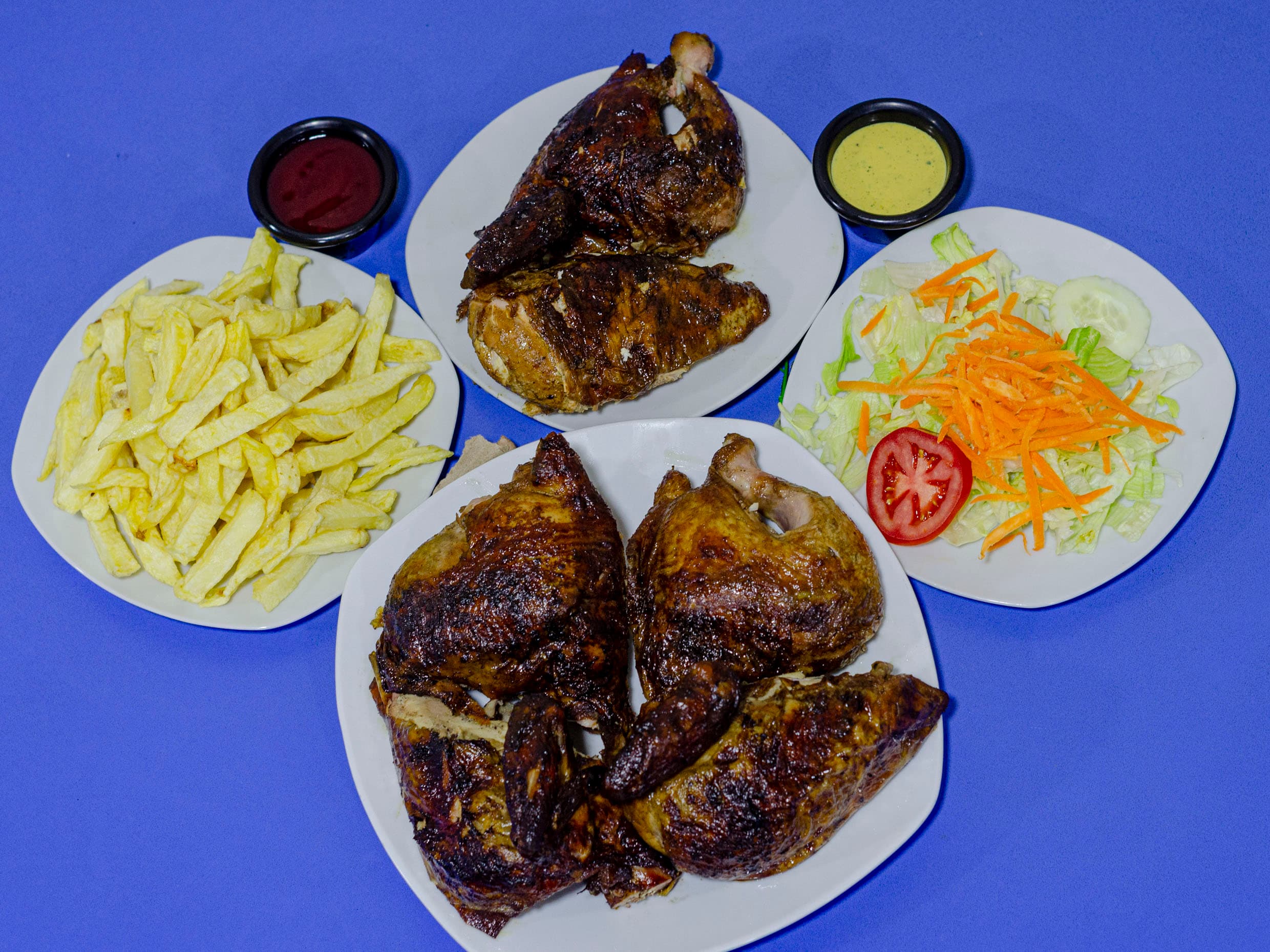 1 Pollo a la Leña más 1/2 de Pollo Pierna Solo