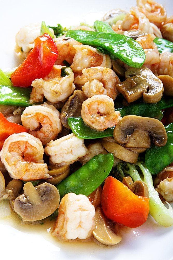 Langostinos Saltado con Champiñones