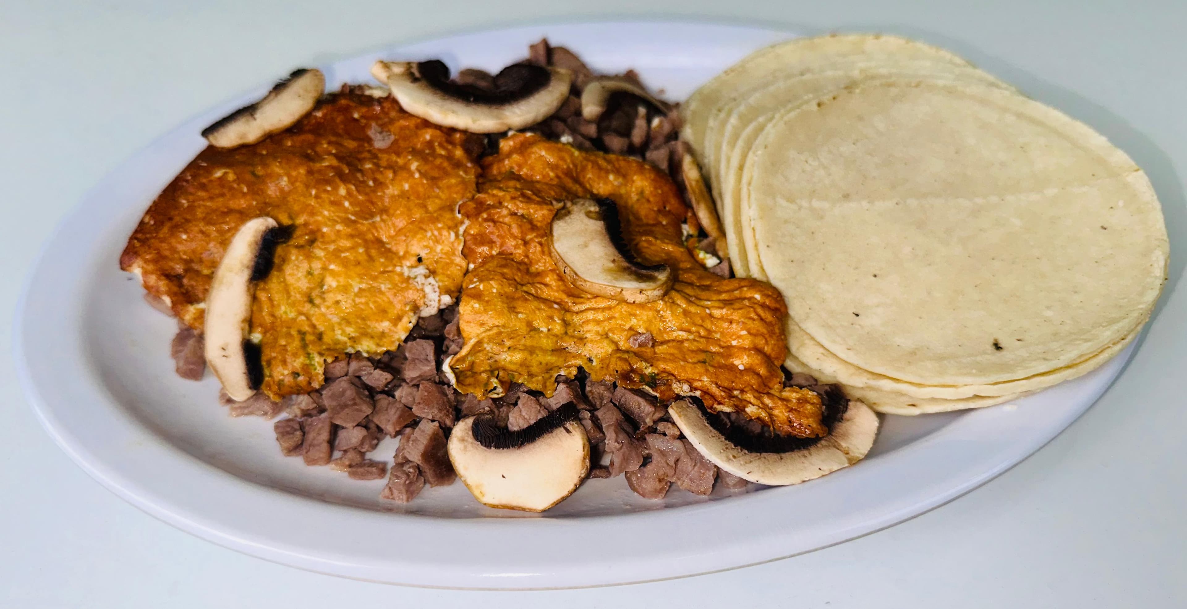 Combinado de Bistec con Champiñones