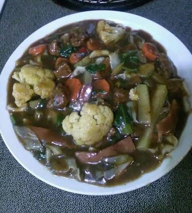 Entero Chop Suey con Lechón en Salsa de la casa