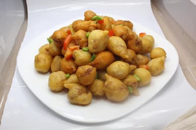 Nuggets de Pollo y Un Rollo Primavera.