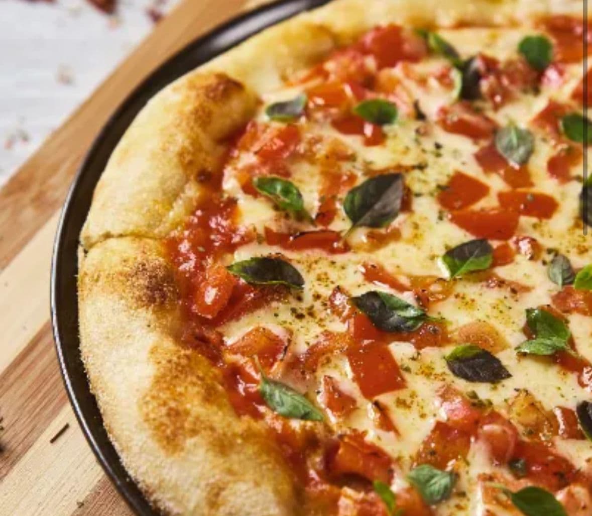 Promo Independencia: Pizza pequeña 8 porciones