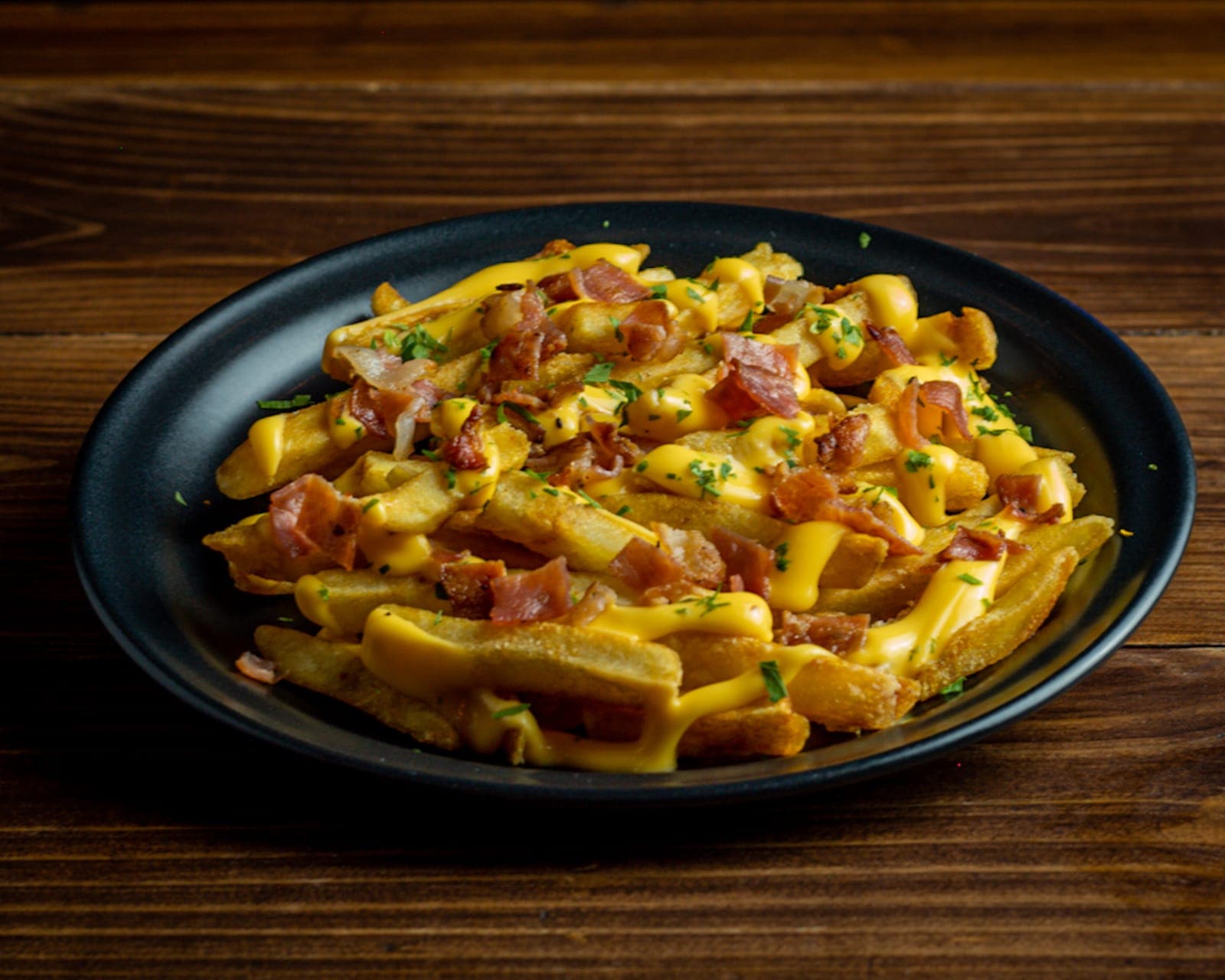 Papas a la Francesa con Queso y Tocino