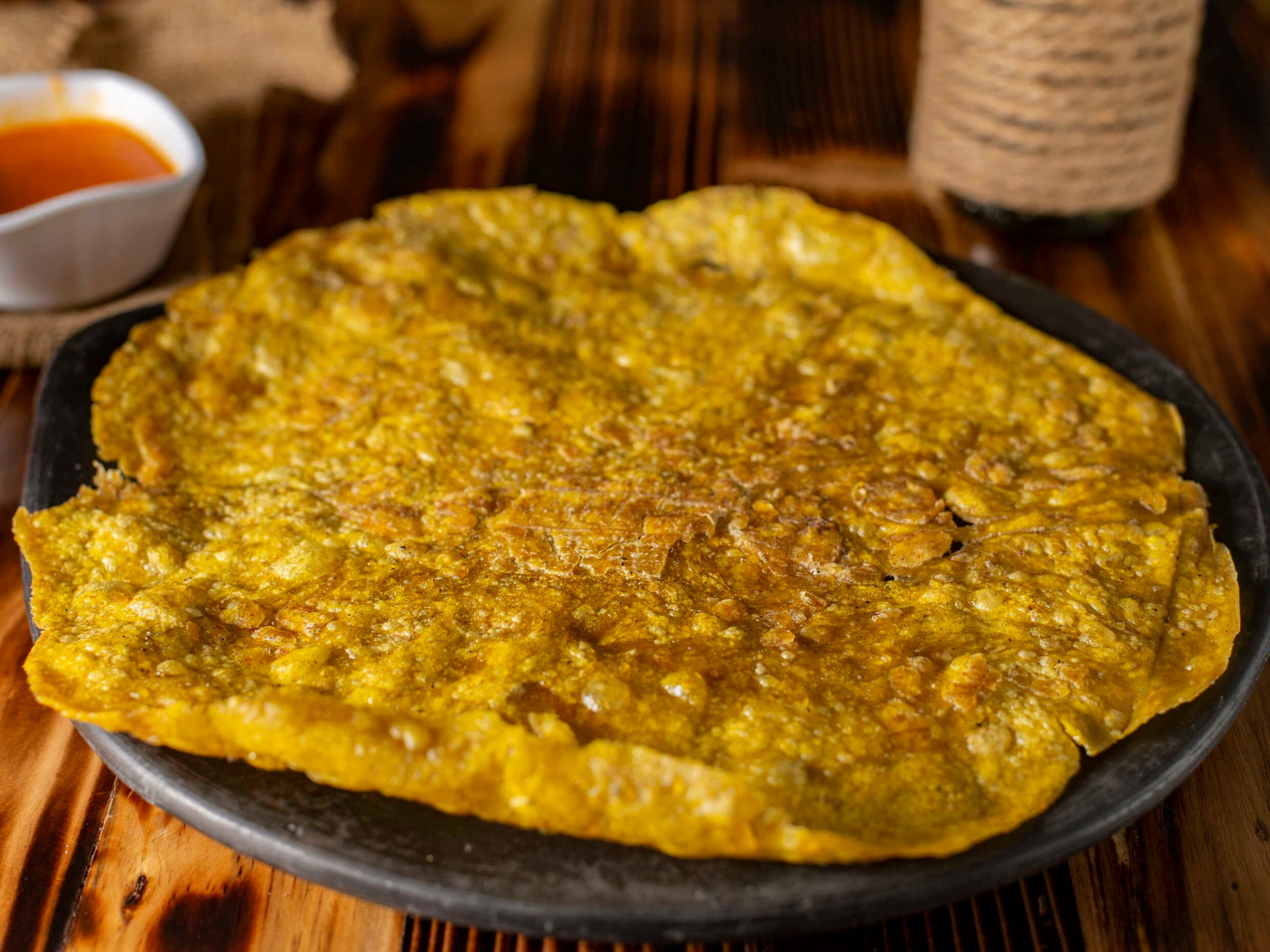 Tostón con Salsa Criolla
