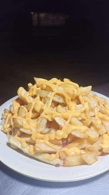 Papas con Queso Cheddar