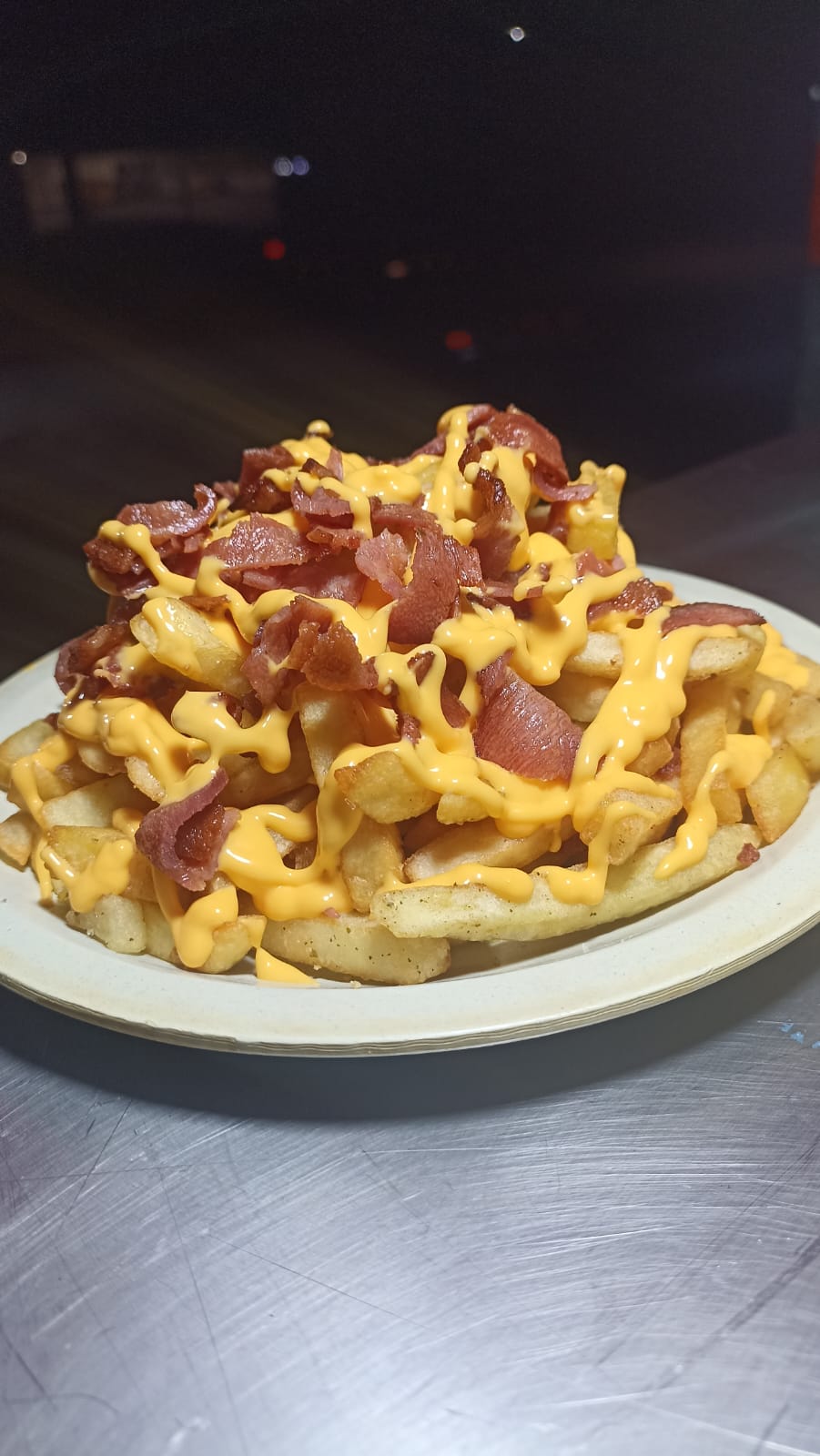 Papas con Queso Cheddar y Tocino
