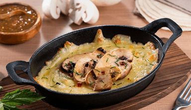 Queso Fundido con Champiñones