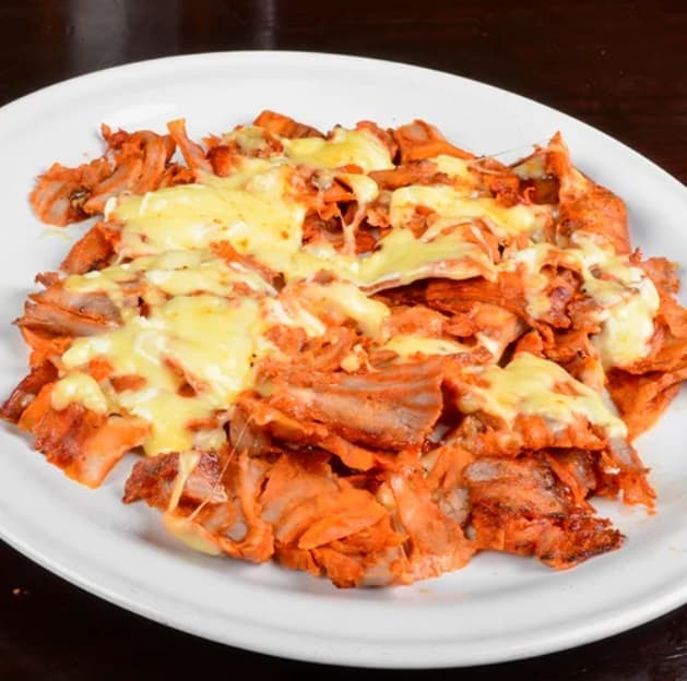 Pastor con queso y piña