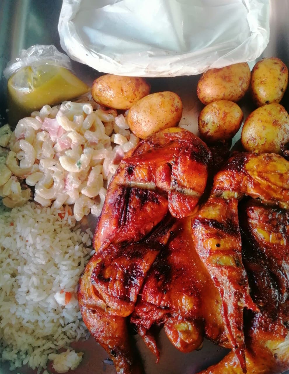 Combo Medio Pollo Ranchero + arroz+ salsa
