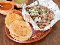 Papa Gratinada con Carne Asada