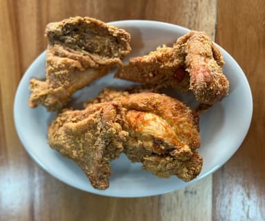 Medio pollo apanado