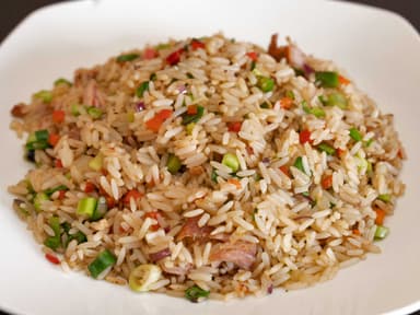 Entero de arroz con cerdo mas refresco de 600 ml