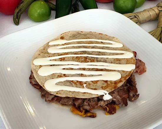 Sincronizada con Bistec