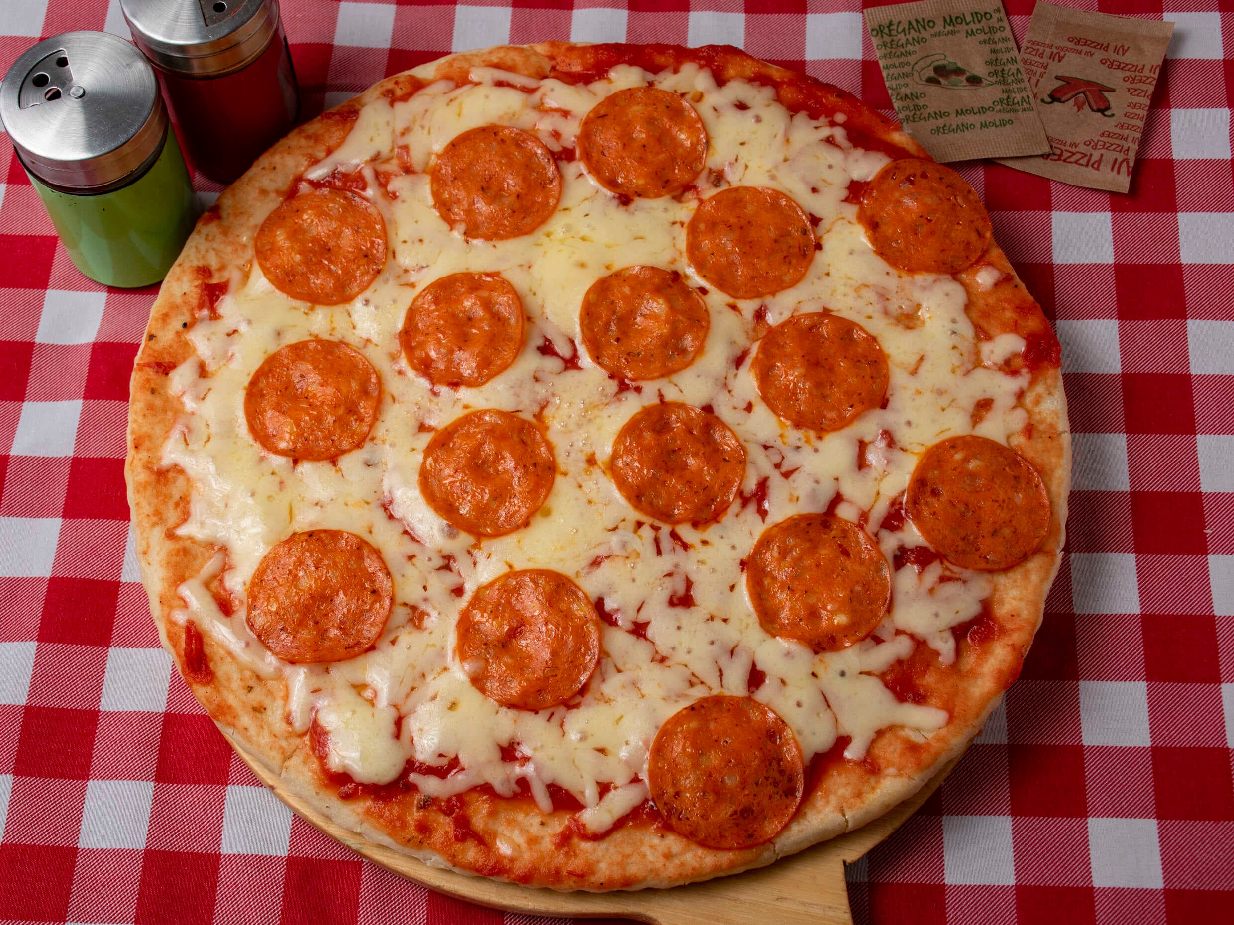 1 Pizza Familiar + 1 Gaseosa 1 Litro