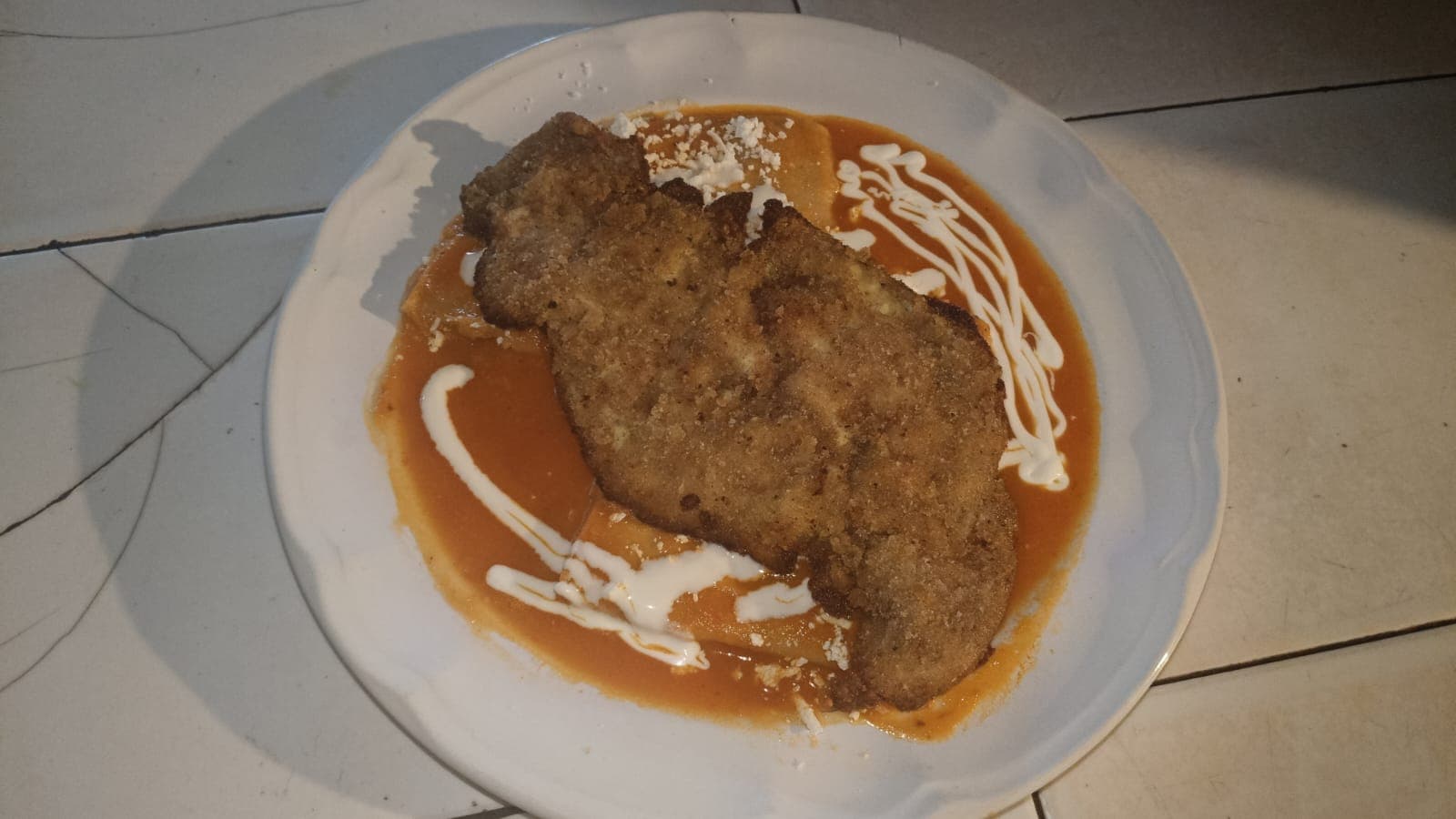 Enchiladas y chilaquiles de tu preferencia