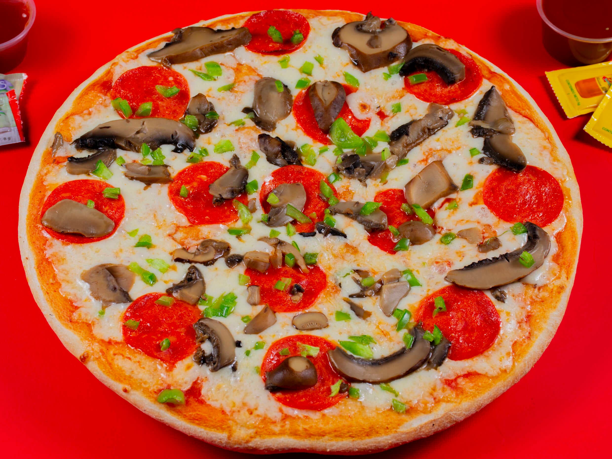 PIZZA SUPREMA+COCA FAMILIAR