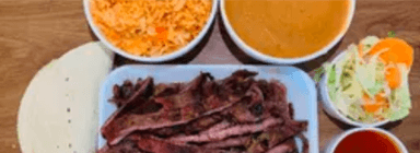 Medio de Asada Puerco + Refresco 600 ml.