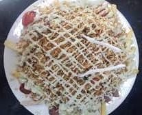 Salchipapa Suiza Gratinada
