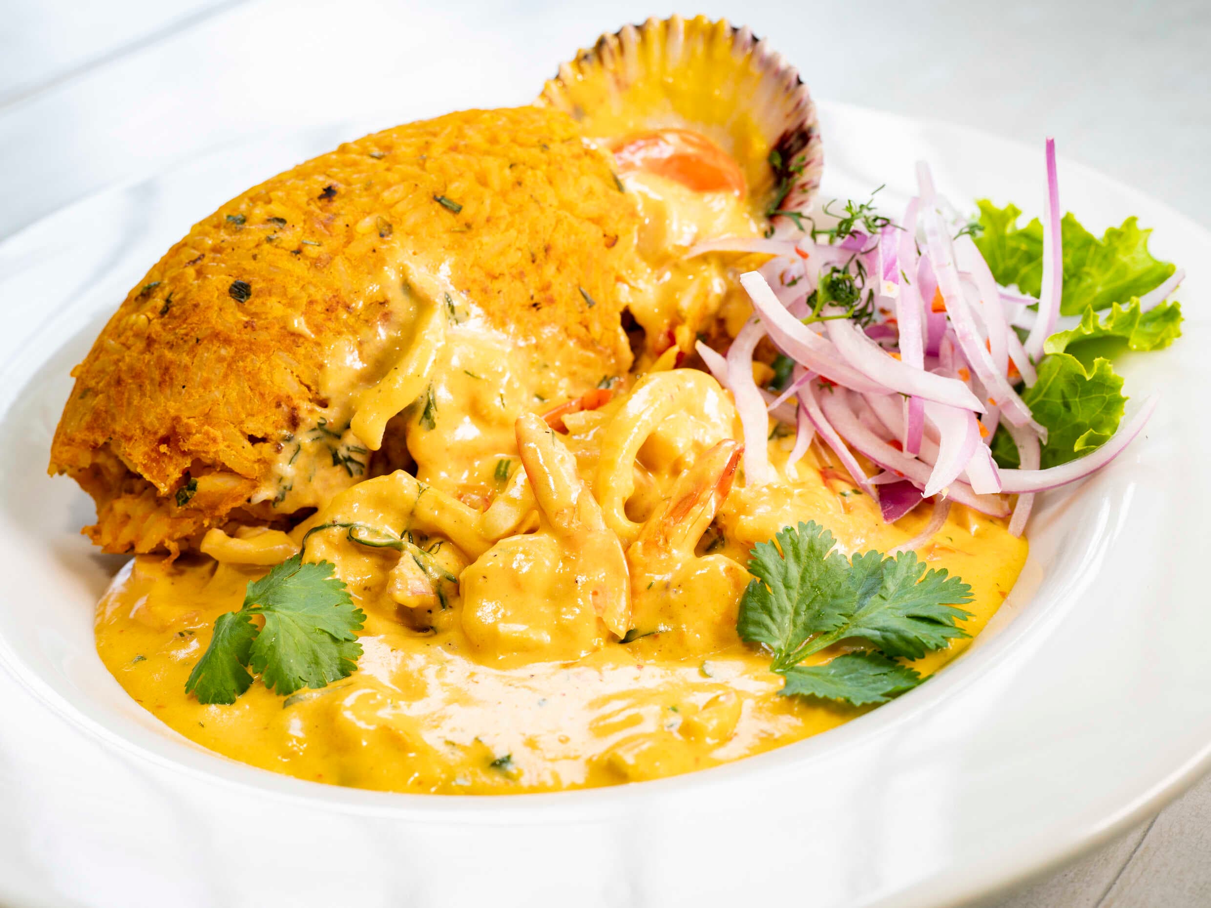 Tacu Tacu en Salsa de Mariscos