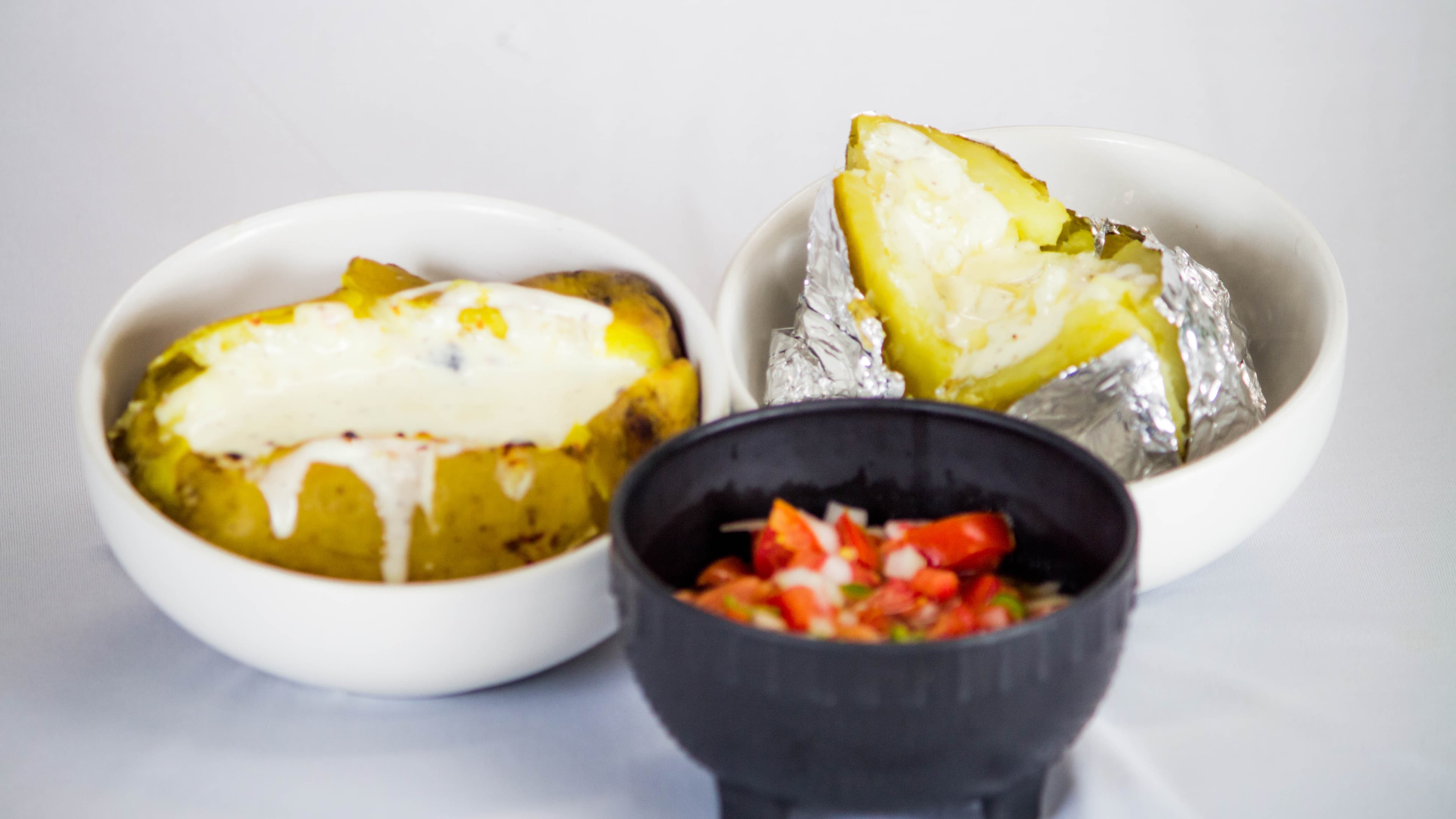 Papas con Chorizo y Queso Gratinado