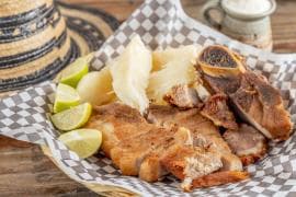 Por 1 Chuleta lleva GRATIS bebida de agua de arroz